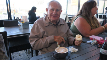 Customer Ron Coleman tucking into an ice cream and coffee at Whitstable Harbour (2)